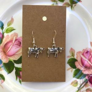 Small dangly cow earrings